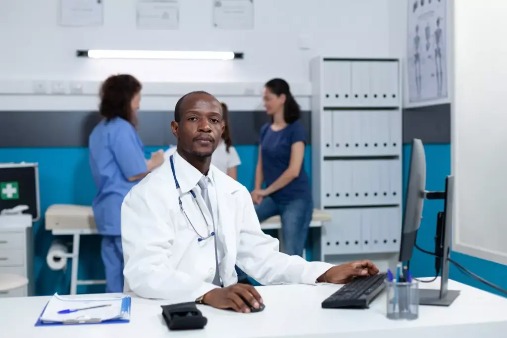 A brightly lit medical office, with a doctor and patient engaged in a thoughtful discussion. The doctor gestures towards a display of prescription medication bottles, conveying the concept of medication-assisted therapy. The patient appears attentive, their expression a mix of hope and determination. Soft, diffused lighting creates a warm, comforting atmosphere, reflecting the trust and collaborative nature of the treatment process. The scene is captured from a slightly elevated angle, providing a sense of depth and emphasizing the importance of the interaction. The background features neutral tones and minimal clutter, allowing the focus to remain on the central figures and the medical treatment they are exploring.