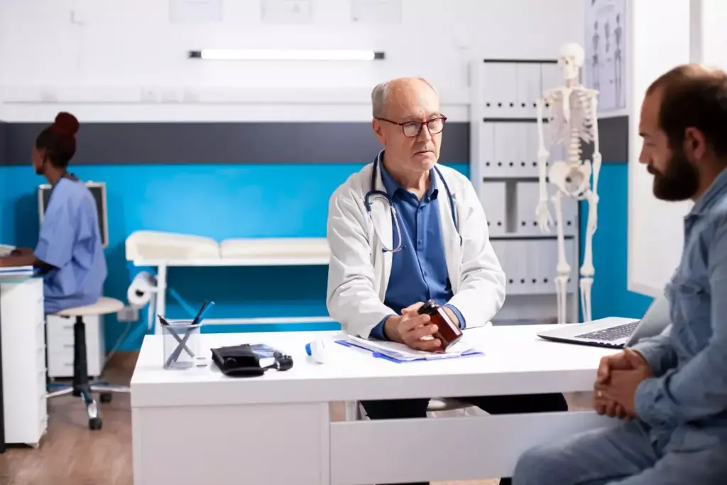 A chemo oncologist in a modern, well-lit hospital setting, wearing a white lab coat and stethoscope, intently examining medical charts and discussing treatment options with a patient. The oncologist's face is warm and empathetic, conveying a sense of care and expertise. The background features state-of-the-art medical equipment and a soothing, calming color palette. The image is captured with a shallow depth of field, bringing the oncologist into sharp focus while gently blurring the surroundings, creating a sense of intimacy and professionalism.