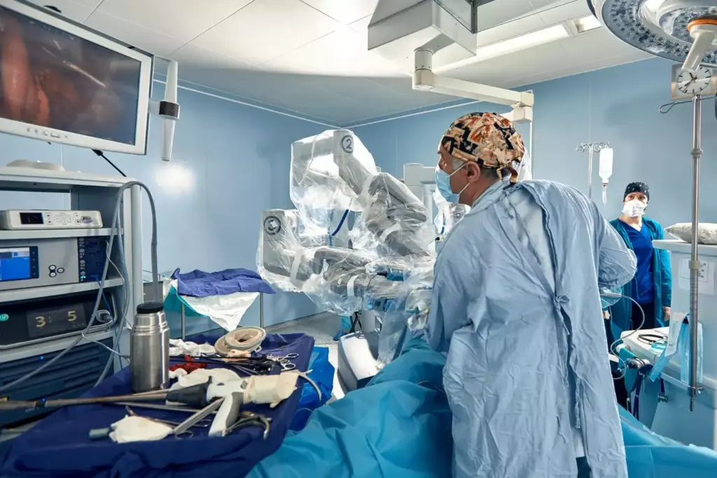 A cutting-edge robotic surgical system dominates the foreground, its sleek metallic arms and precise instruments poised for a minimally invasive procedure. In the middle ground, a surgeon sits at a console, guiding the robotic movements with deft precision. The operating room backdrop is bathed in a soft, warm lighting, creating an atmosphere of advanced medical technology and patient-centric care. The scene conveys the sophistication and safety of modern robotic-assisted laparoscopic surgery, a transformative approach to minimally invasive procedures.