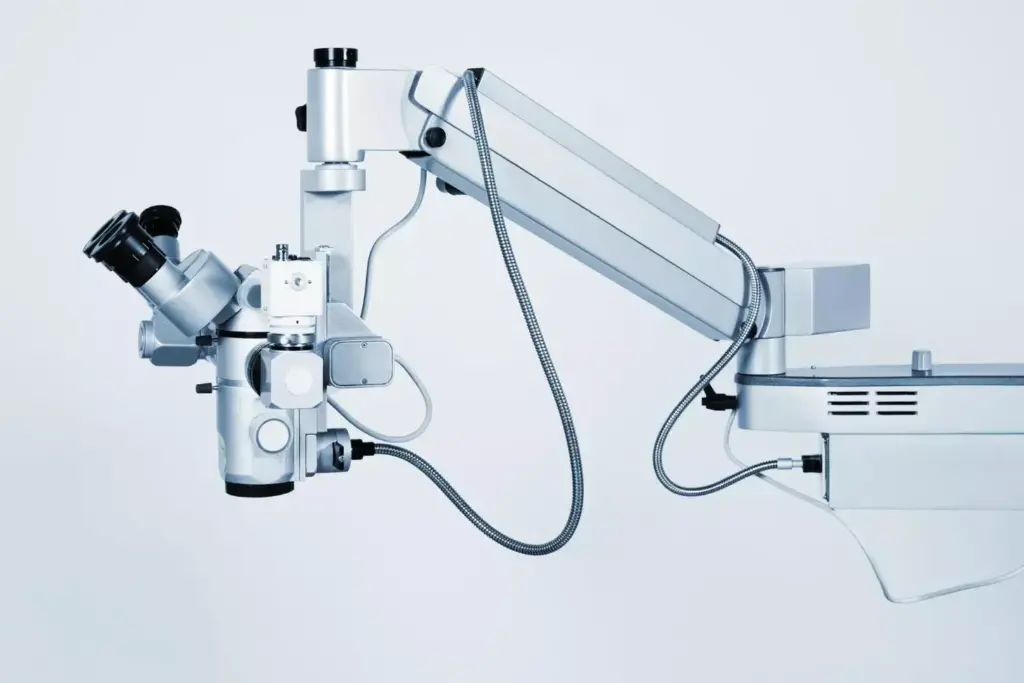 A detailed, high-resolution image of the Da Vinci Surgical System, a state-of-the-art robotic surgical platform used for minimally invasive procedures. The system is shown in the foreground, its intricate robotic arms and instruments gleaming under bright, directional lighting that casts crisp shadows. The middle ground features a clean, sterile surgical suite with tiled floors and neutral-toned walls, conveying a sense of clinical precision. In the background, a panoramic view of the operating theater reveals advanced medical equipment and monitors, suggesting the system's technological sophistication. The overall mood is one of technical prowess, clinical rigor, and the cutting edge of modern surgical innovation.