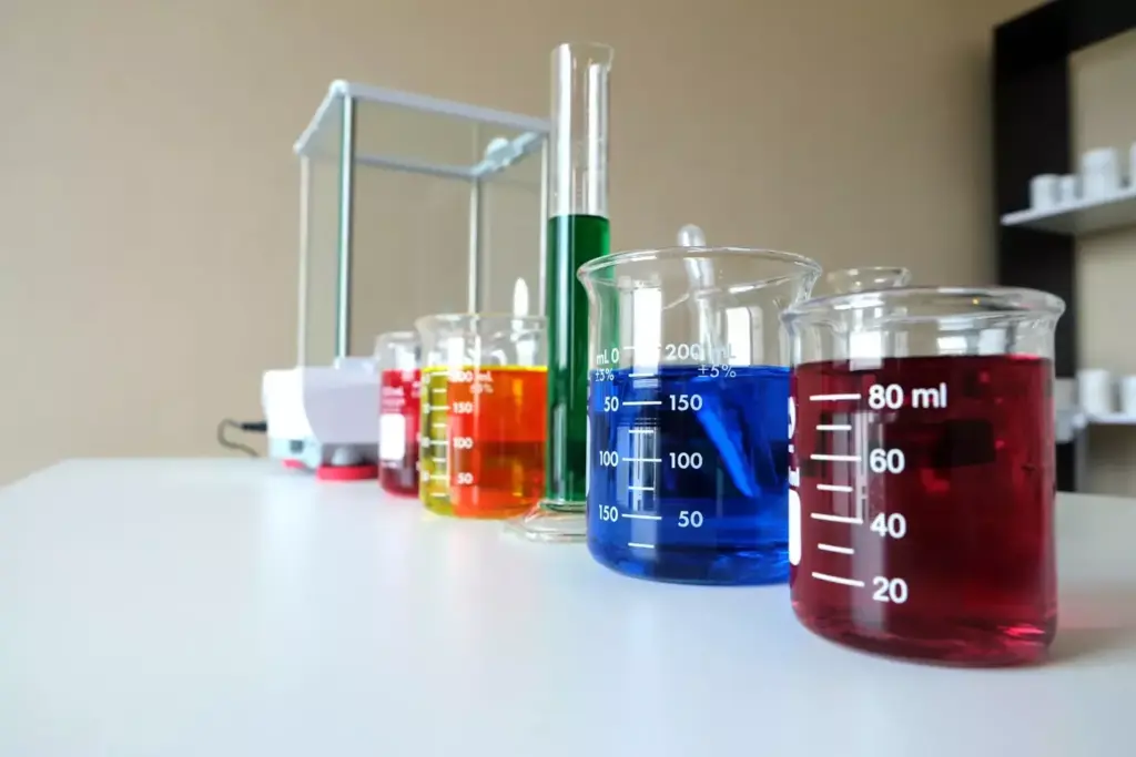 A dimly lit laboratory with an array of glassware, test tubes, and scientific instruments on a cluttered wooden table. In the foreground, a focused researcher in a white coat closely examines a vial of clear liquid, deep in contemplation. Soft, warm lighting casts dramatic shadows, creating an atmosphere of scientific discovery. In the background, shelves filled with books and journals suggest the intellectual rigor of the pursuit. The scene conveys a sense of the accidental, serendipitous nature of this medical breakthrough, emerging from the shadows of wartime research.