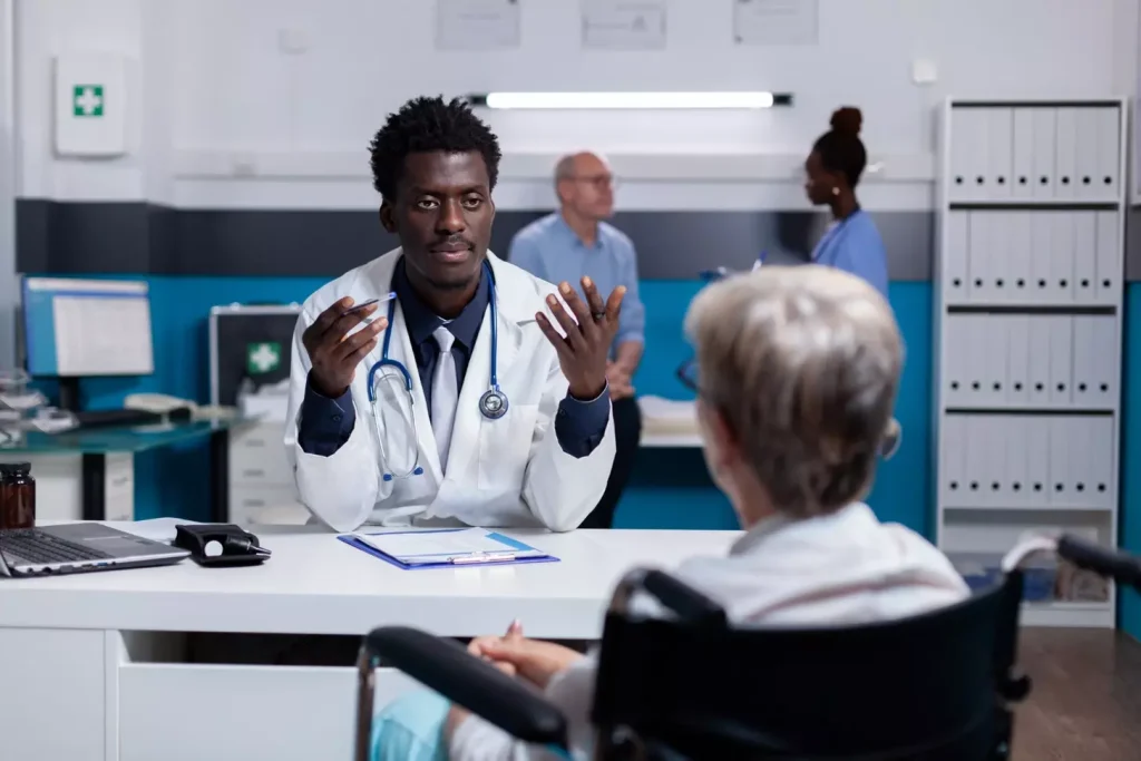 A doctor talking to a patient