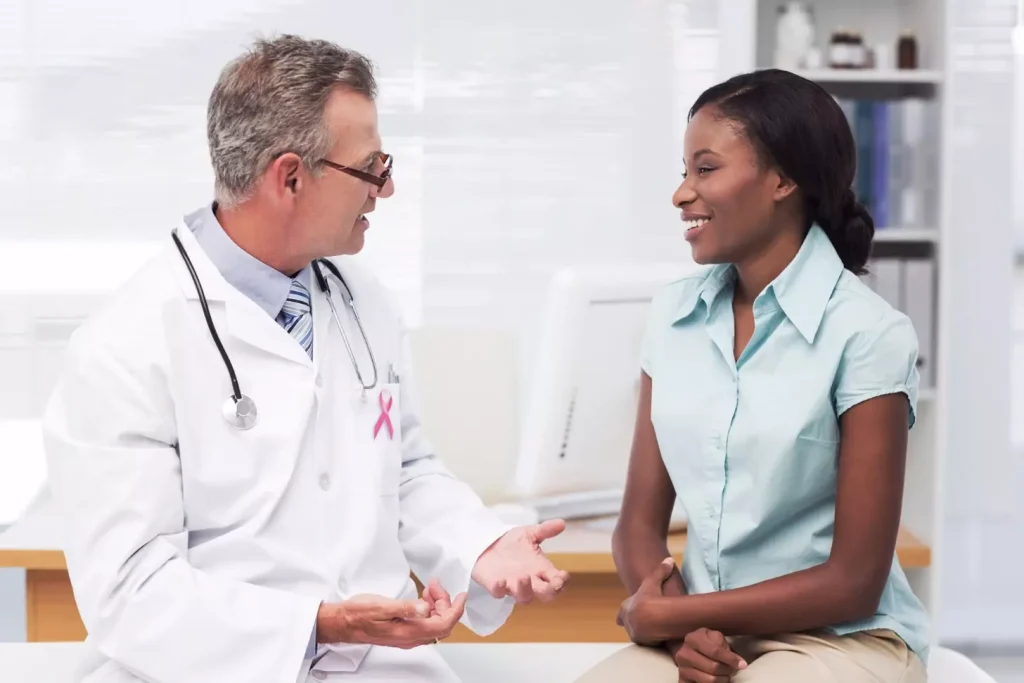 A doctor talking to a patient