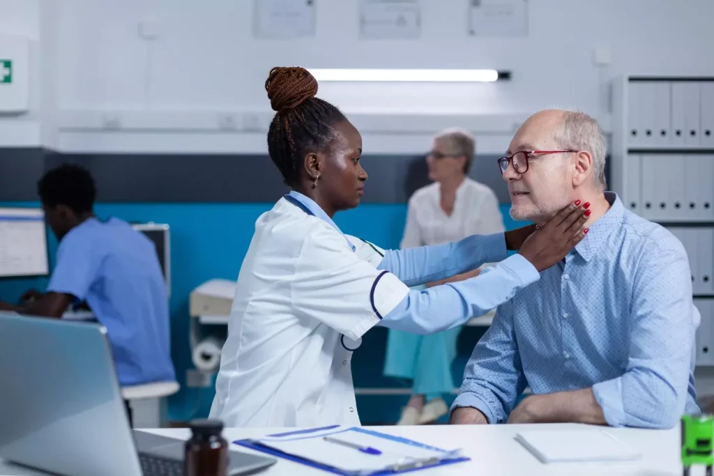 A doctor talking to a patient