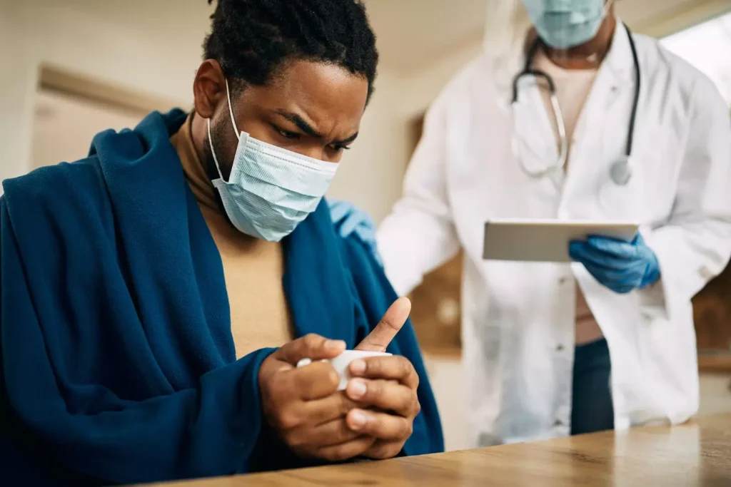 A doctor talking to a patient