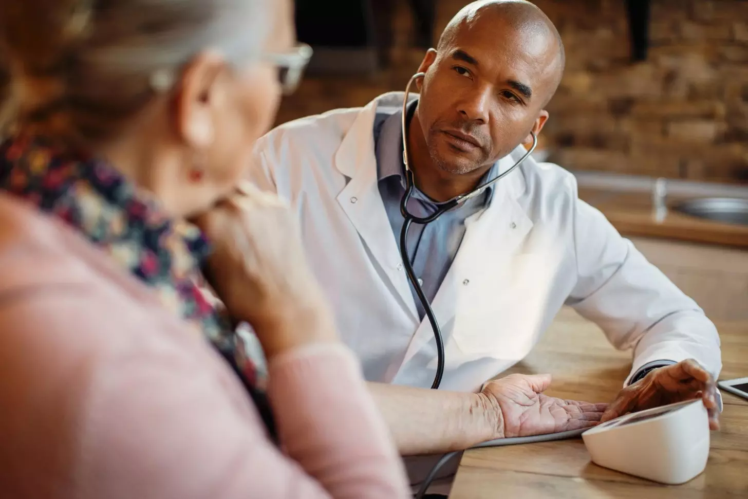 A doctor talking to a patient