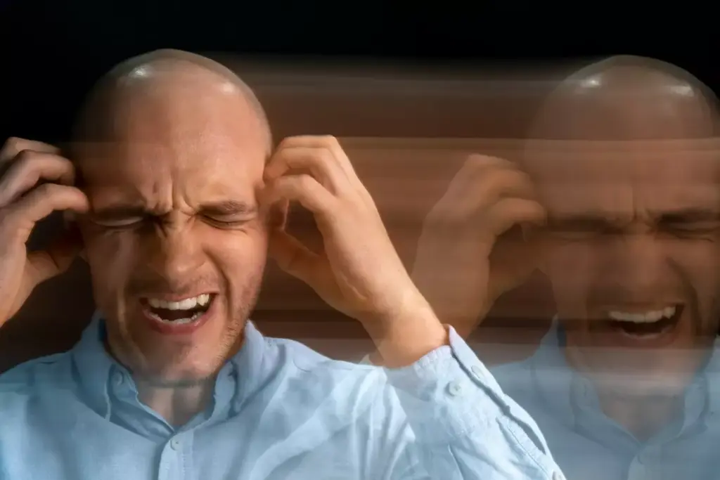 A hazy, dreamlike scene depicting the distorted and fragmented vision of a brain tumor patient. In the foreground, a blurred and discolored eye gazes outward, the iris and pupil morphing and pulsing unnaturally. The middle ground reveals a partially obscured, kaleidoscopic landscape, with shapes and colors bending and shifting unpredictably. The background fades into a soft, muted blur, as if viewed through a thick, distorting lens. Soft, diffused lighting casts a melancholic, almost otherworldly atmosphere, conveying the disorientation and visual impairment experienced by those with brain tumor-related vision problems.