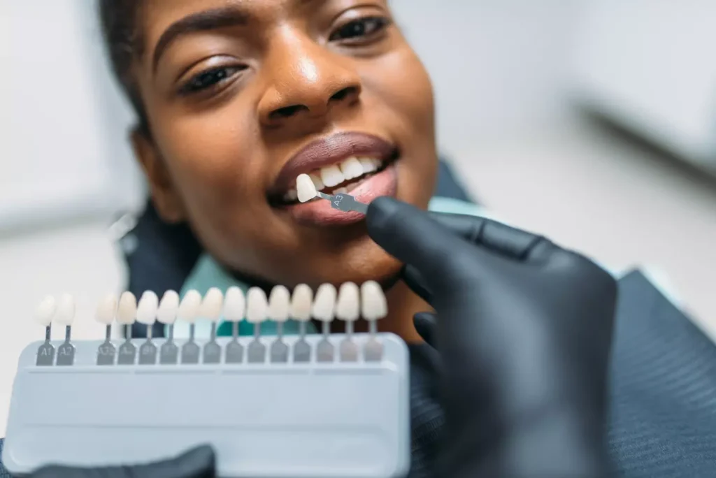 A high-detailed, medical illustration of a dental bone grafting procedure, showing the step-by-step process. In the foreground, a close-up view of the oral cavity with the jawbone exposed, revealing the surgical site and the placement of the bone graft material. The middle ground features a team of dental professionals, dressed in scrubs, carefully performing the procedure with precision medical instruments. The background depicts a sterile, well-lit operating room environment with advanced dental equipment and technology. The overall scene conveys a sense of clinical professionalism, scientific accuracy, and the intricate nature of the bone grafting technique. A high-detailed, medical illustration of a dental bone grafting procedure, showing the step-by-step process. In the foreground, a close-up view of the oral cavity with the jawbone exposed, revealing the surgical site and the placement of the bone graft material. The middle ground features a team of dental professionals, dressed in scrubs, carefully performing the procedure with precision medical instruments. The background depicts a sterile, well-lit operating room environment with advanced dental equipment and technology. The overall scene conveys a sense of clinical professionalism, scientific accuracy, and the intricate nature of the bone grafting technique.