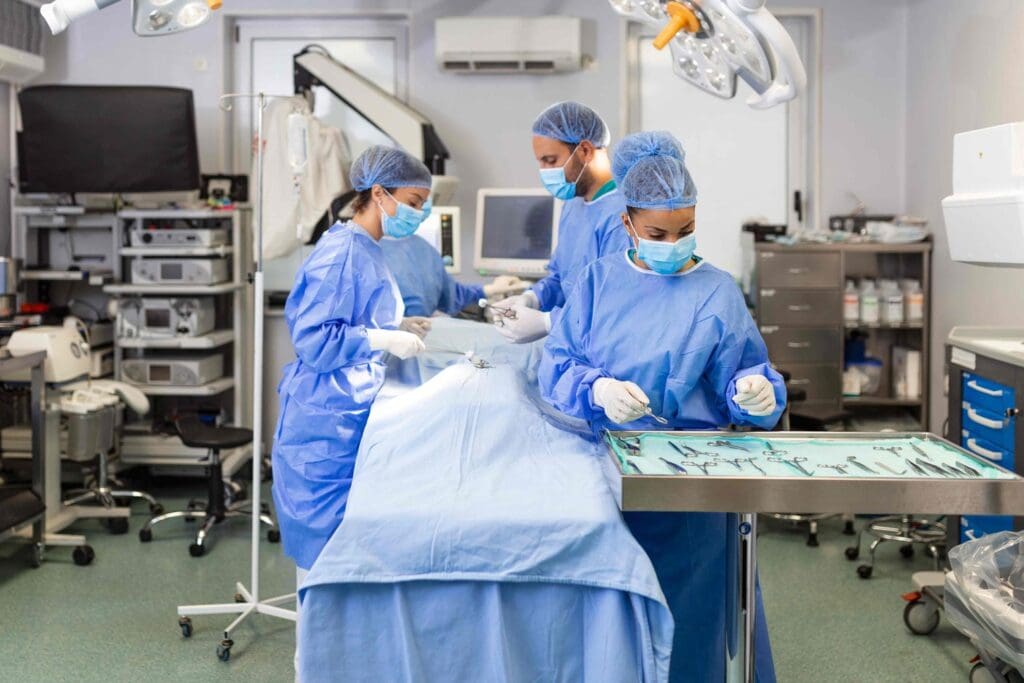 A hospital operating room with a bright, clinical atmosphere
