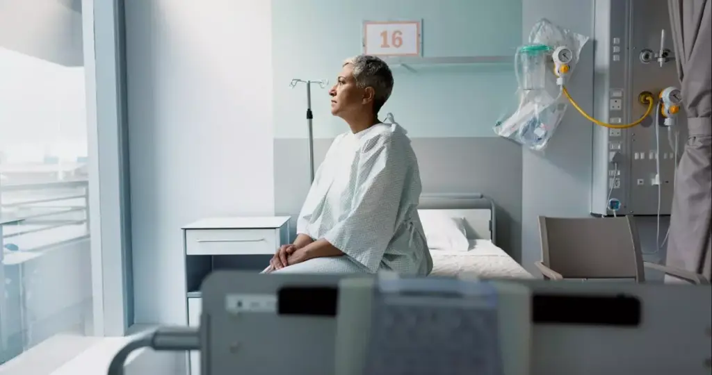 A hospital room with a patient sitting in a comfortable chair, connected to an intravenous (IV) chemotherapy drip. The room is well-lit, with natural light streaming in through large windows, creating a serene and calming atmosphere. The patient is surrounded by modern medical equipment, with nurses and doctors carefully monitoring the infusion process. In the foreground, the IV tubing and medical devices are prominently featured, conveying the technical aspects of chemo infusion therapy. The patient's facial expression reflects a sense of hope and resilience, as they undergo this crucial stage of their cancer treatment. A hospital room with a patient sitting in a comfortable chair, connected to an intravenous (IV) chemotherapy drip. The room is well-lit, with natural light streaming in through large windows, creating a serene and calming atmosphere. The patient is surrounded by modern medical equipment, with nurses and doctors carefully monitoring the infusion process. In the foreground, the IV tubing and medical devices are prominently featured, conveying the technical aspects of chemo infusion therapy. The patient's facial expression reflects a sense of hope and resilience, as they undergo this crucial stage of their cancer treatment.