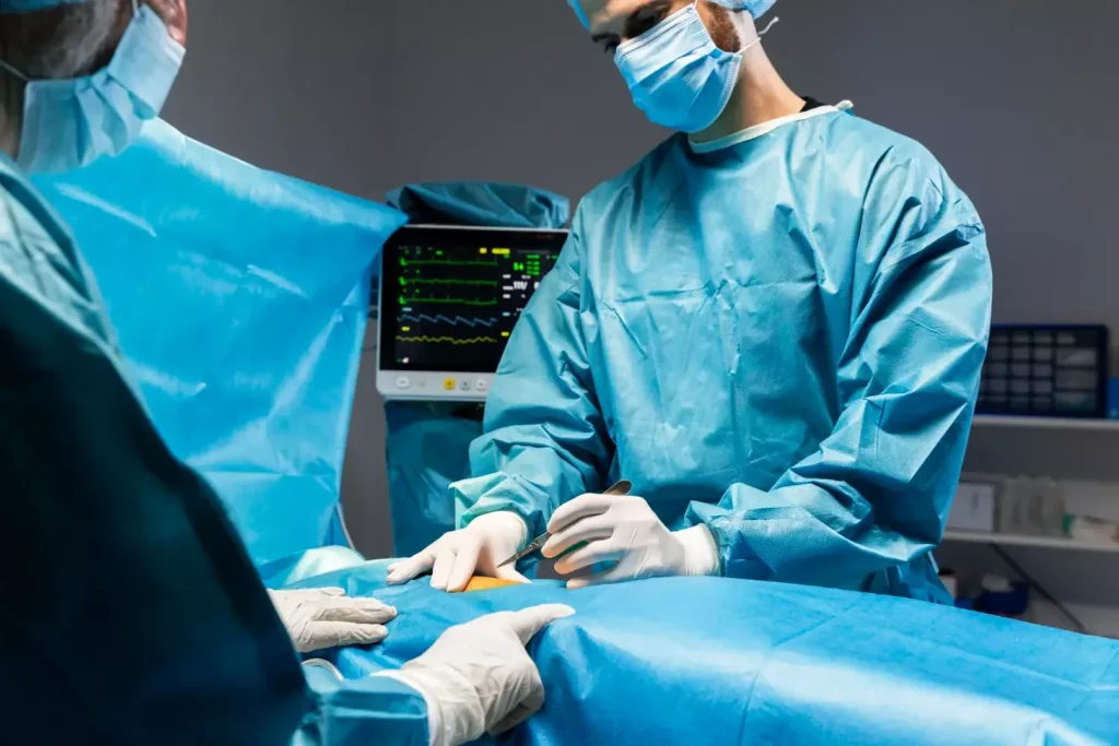 A sterile, well-lit medical procedure room, with a patient lying on an examination table. In the foreground, a doctor's hand is carefully inserting a thin, flexible catheter into the patient's urethra. The middle ground shows the doctor's face in concentration, while medical equipment and supplies are neatly arranged on a nearby tray. The background features clean, white walls and efficient lighting, conveying a sense of professionalism and clinical precision. The overall mood is one of focused, meticulous care during the intravesical administration process.