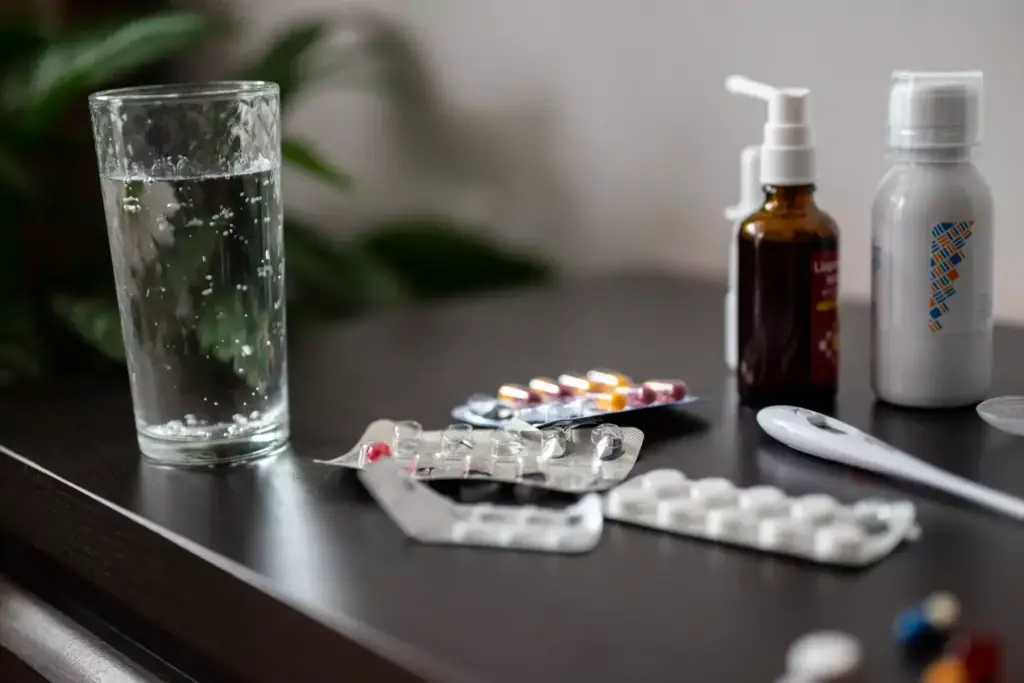 A well-lit, high-resolution image showcasing a variety of over-the-counter arthritis pain relief options. In the foreground, prominently display an assortment of medications, creams, and ointments commonly used to alleviate arthritis symptoms, arranged in an organized manner. In the middle ground, include a detailed illustration of a human hand or joint, highlighting the affected areas and the mechanisms of arthritis pain. In the background, a clean, minimalist setting with a soft, soothing color palette to convey a sense of calm and wellness. Utilize natural lighting and a shallow depth of field to create a professional, editorial-style composition that effectively communicates the subject of arthritis pain relief options.