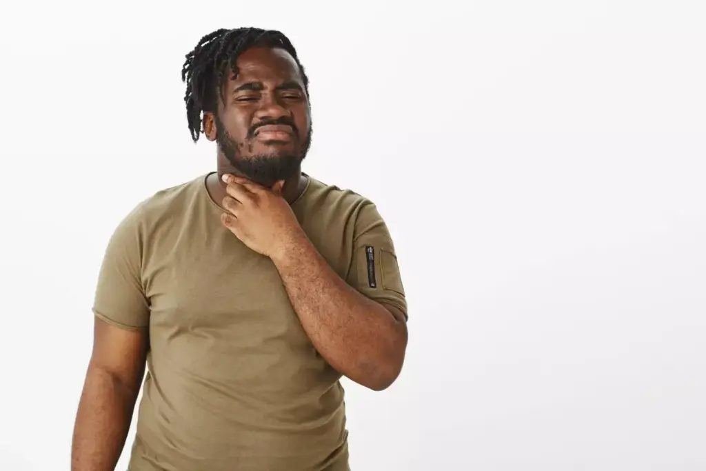 Atypical chest pain: a dull, pressing ache radiating to the back, shoulders, and jaw, accompanied by shortness of breath and nausea. The foreground depicts a patient's torso, contorted in discomfort, with a subtle hue of unease. The middle ground showcases a detailed anatomical rendering of the heart, its chambers and vessels illuminated, highlighting the subtle distress. The background subtly shifts, a muted palette of grays and blues, evoking a sense of uncertainty and the gravity of the situation. Warm, indirect lighting casts gentle shadows, capturing the complexities of this atypical presentation. Captured with a medium-wide lens, the composition draws the viewer's attention to the nuanced details of this non-stereotypical cardiac event.