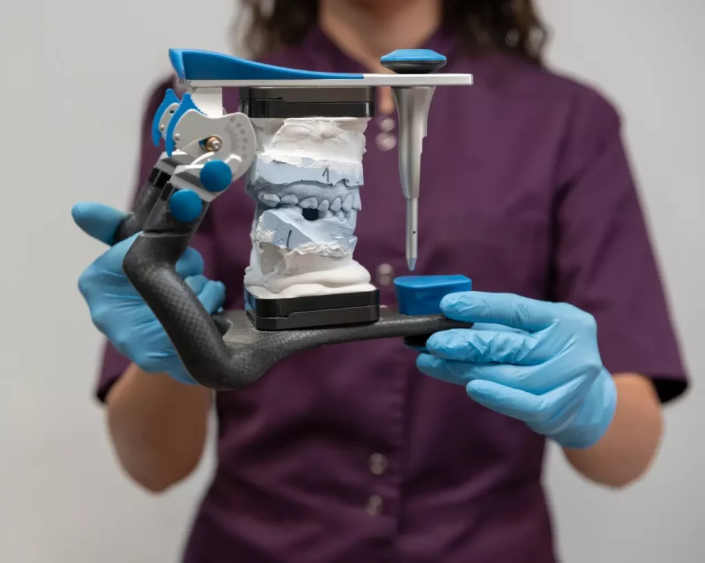 Detailed anatomical study of dental implants and bone grafts. Foreground depicts cross-section of jawbone, revealing titanium implant fixture and surrounding bone graft material. Midground shows magnified view of implant-bone interface, with new bone growth integrating with implant surface. Background softly focused, showcasing dental tools and surgical equipment. Crisp, high-resolution rendering with neutral lighting and clinical, educational tone. Muted color palette emphasizes technical nature of procedure. Smooth, photorealistic style conveys precise medical illustration.
