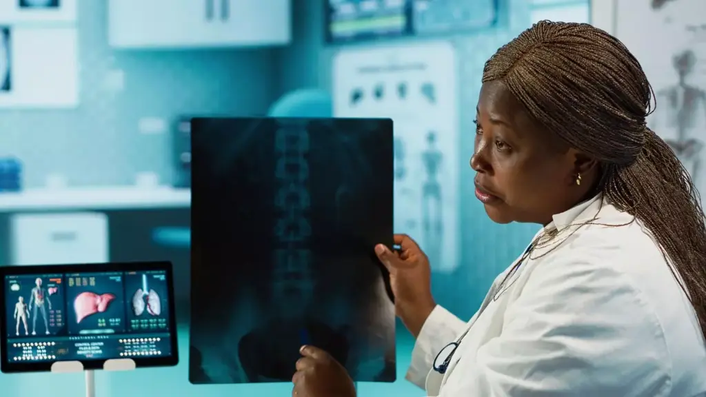 Detailed brain MRI scan of a high-grade glioblastoma tumor, captured with a high-resolution medical imaging device. The image showcases the distinctive irregular shape, heterogeneous composition, and contrast enhancement patterns typical of this aggressive form of brain cancer. Rendered in a muted, clinical color palette to emphasize the diagnostic significance, the scene is lit from the side to accentuate the three-dimensional structure and textural details of the neoplasm. The background is a clean, neutral environment, allowing the tumor's pathological features to be the sole focus of attention.