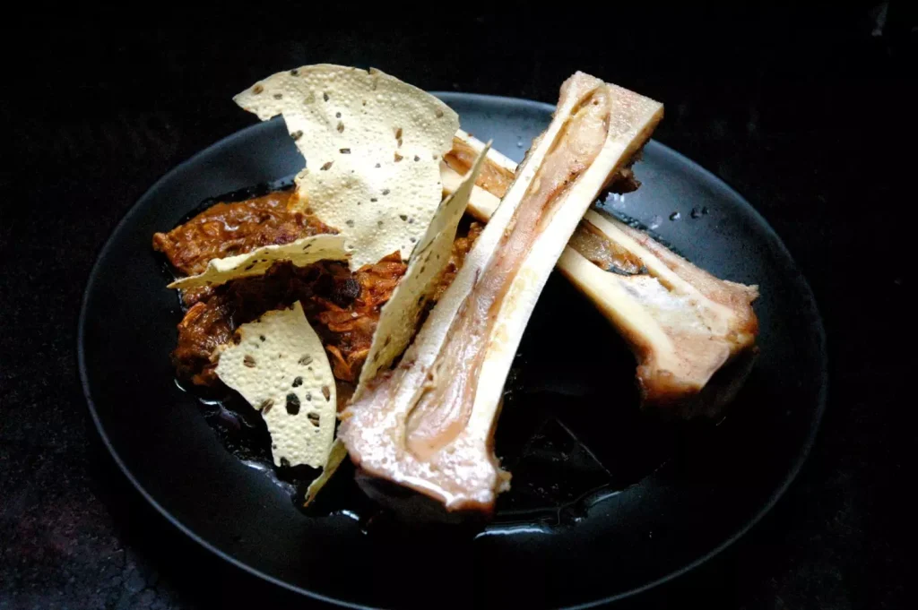 High angle view of roasted bone marrow in plate