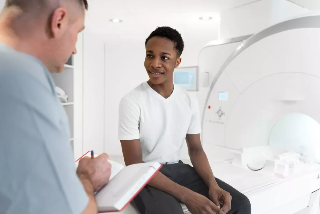 Smiley patient and nurse taking notes