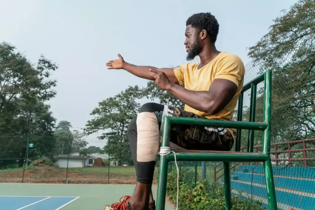 detailed medical illustration of ACL reconstruction surgery, showing a cross-section of the knee joint with the anterior cruciate ligament (ACL) being replaced. the surgery is depicted in a clean, well-lit surgical environment with the incisions, instruments, and reconstructed ACL clearly visible. the image conveys the technical precision and complexity of the procedure, while maintaining a sense of clinical sterility and professionalism appropriate for a medical education context.