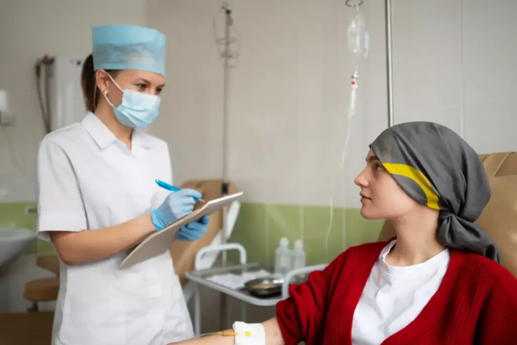 patient's face as they undergo chemotherapy treatment for breast cancer